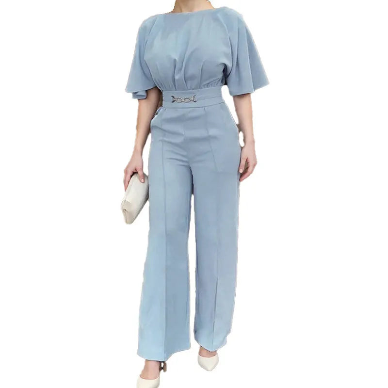 Blue polyester men's formal suit with long sleeve jacket and trousers on a hanger.