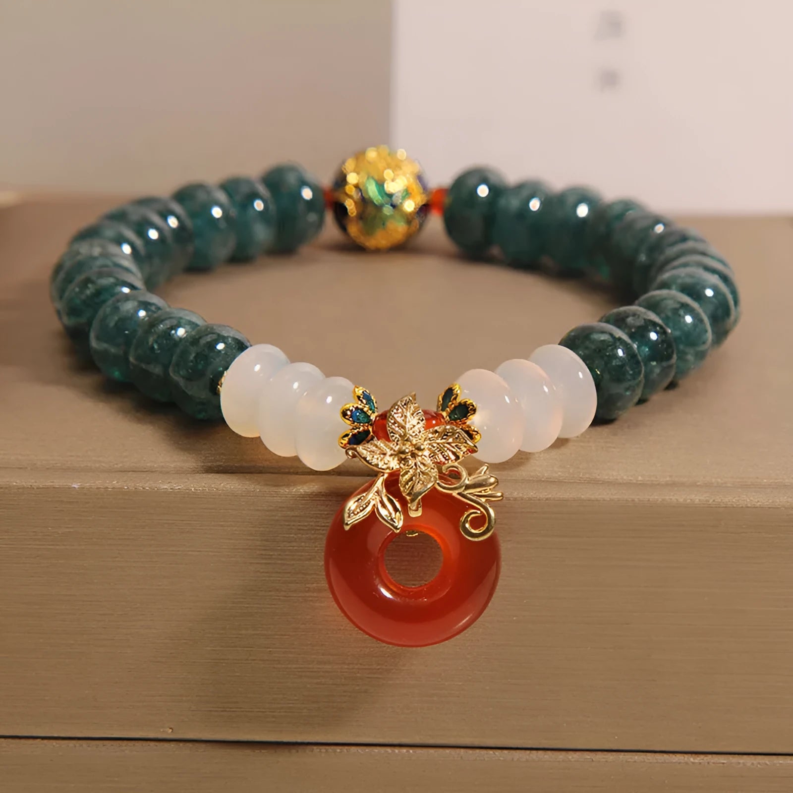 Blue water jade and red agate peace buckle crystal bracelet for women.