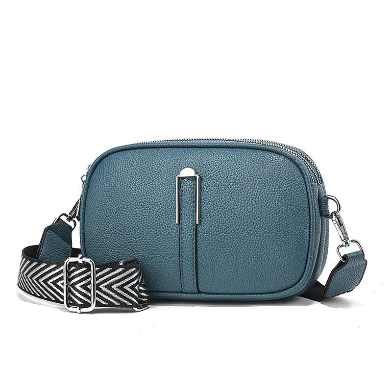 Soft PU leather crossbody bag in khaki colour with multiple compartments and stone pattern detail