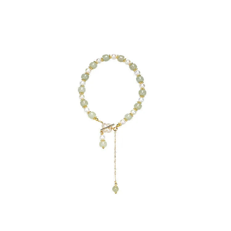Women's bracelet with natural Hetian jade pearl pendant and gold-coloured alloy components