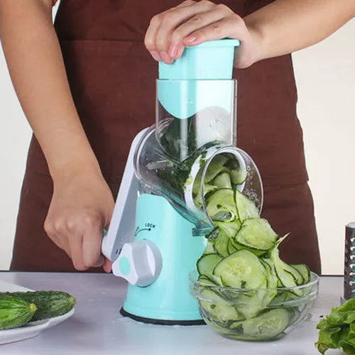 Round manual kitchen mandoline slicer with stainless steel blades in blue, green, or red colour options