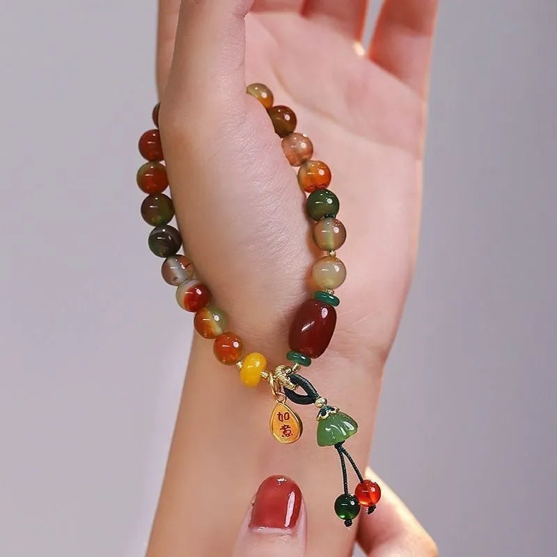 Lotus Ruyi bracelet with mixed materials and handmade construction