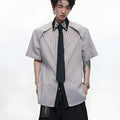 Men's blue patchwork striped shirt with diamond tie detail, loose fit, and button-down collar