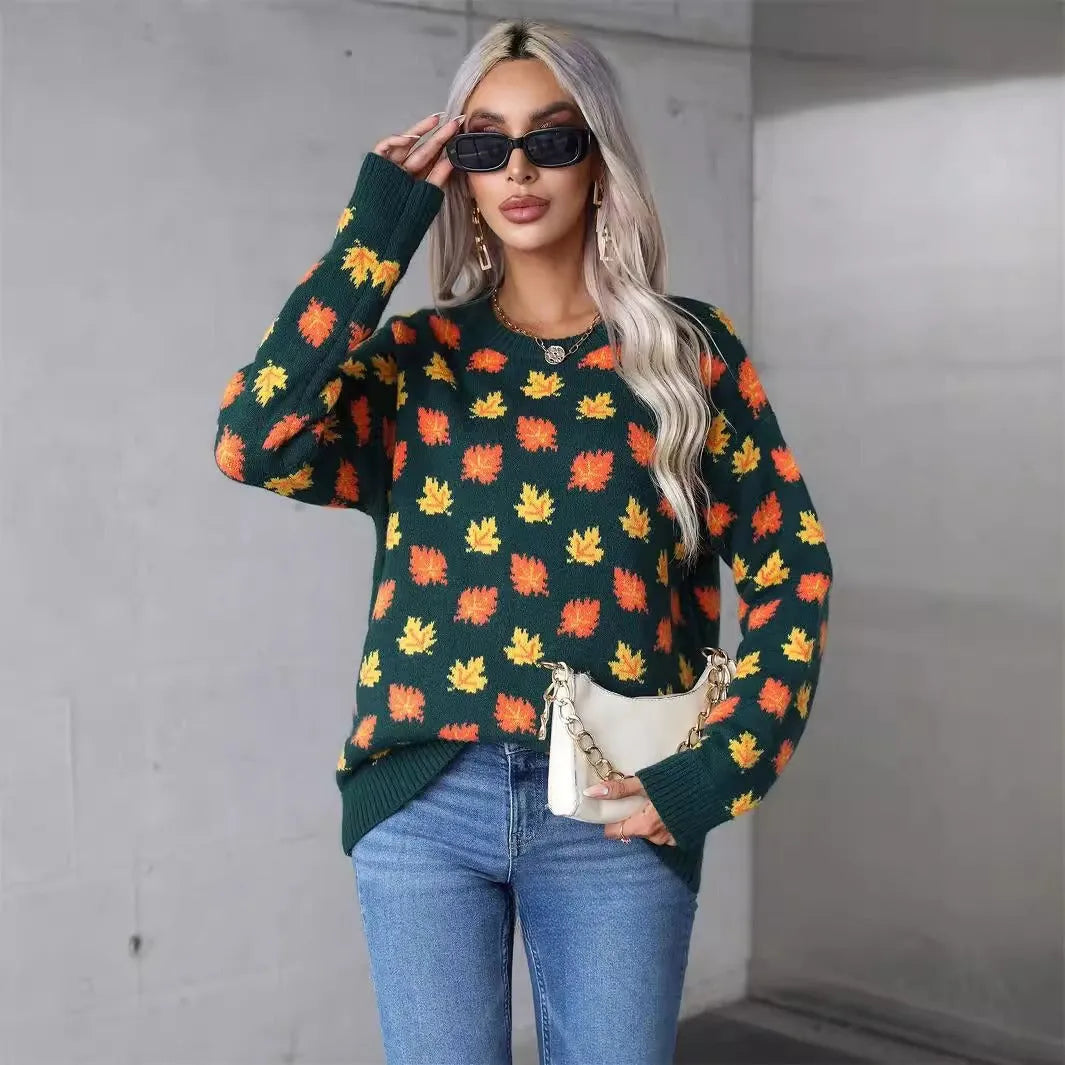 Women's maple leaf Christmas sweater in loose fit with contrast colour design, available in beige or dark green