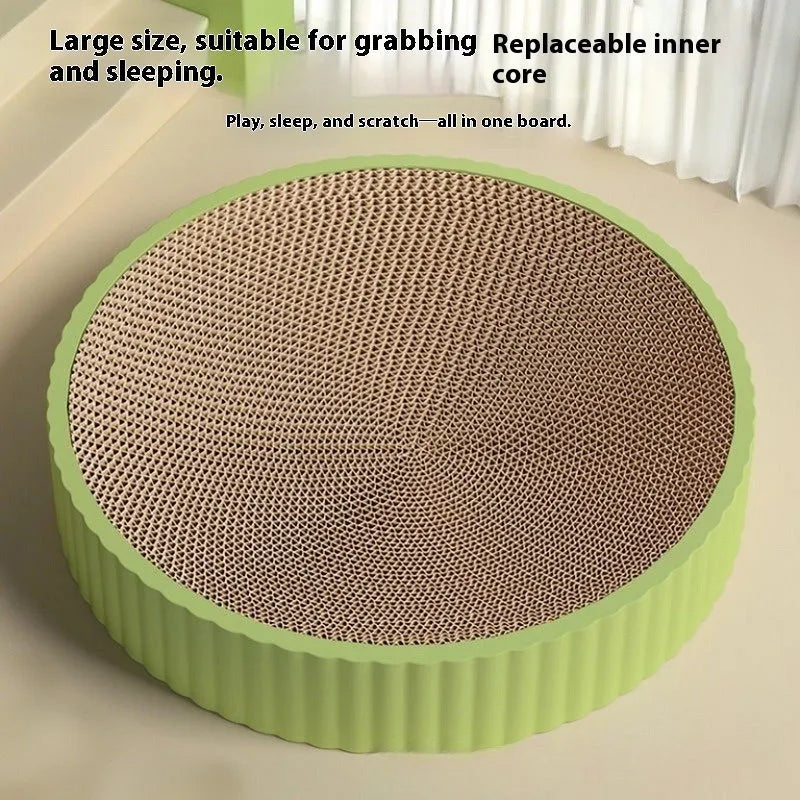 Round green or white cat scratching board nest with replaceable corrugated cardboard centre, 55 cm diameter.