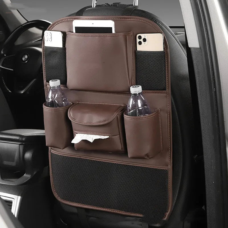 Black PU leather car seat back storage bag hanging on a grey car seat headrest.