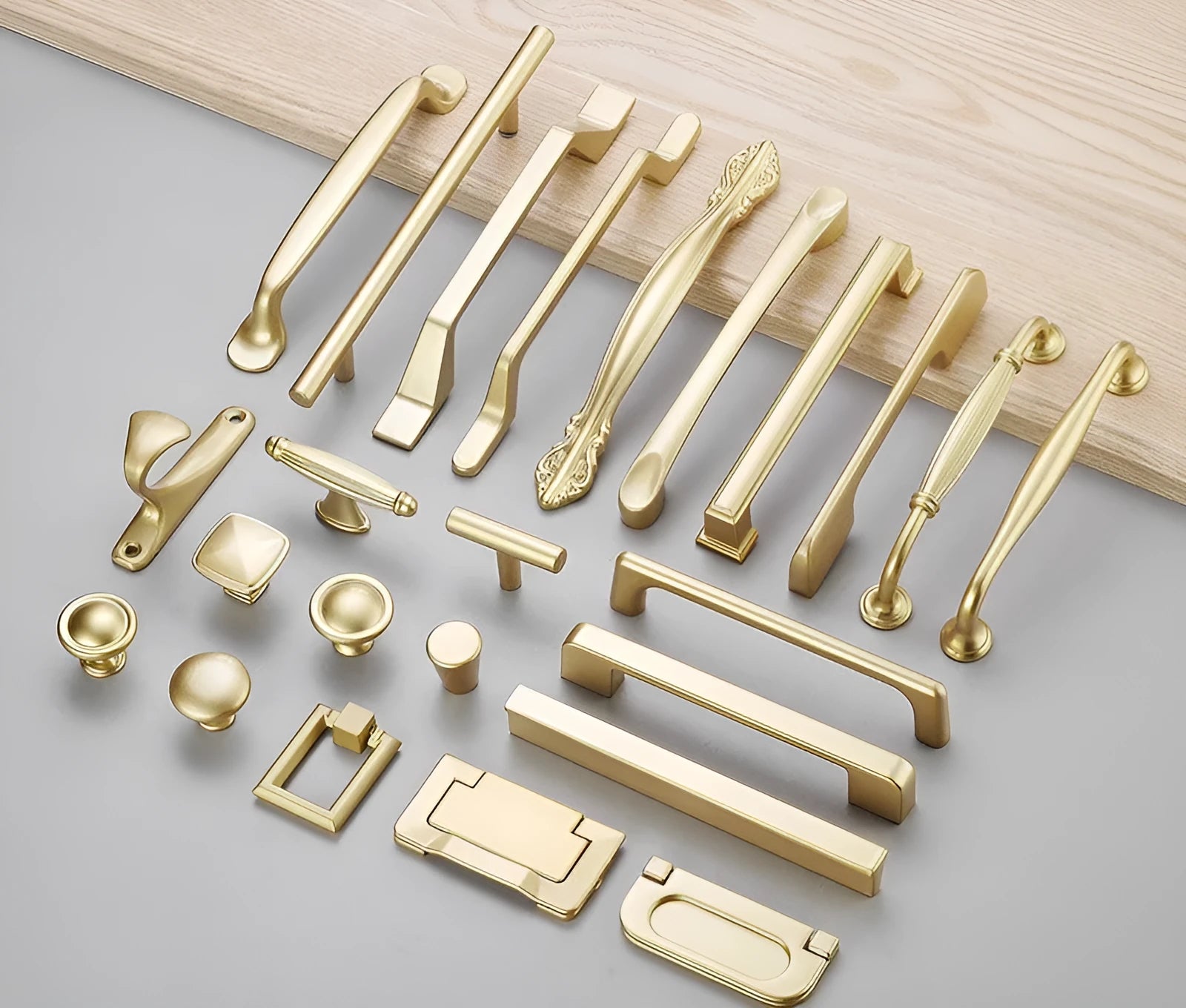 Gold aluminium alloy single-hole cabinet handle in a modern T-shape design.