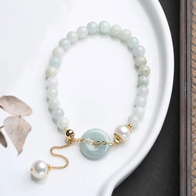 Natural emerald jade peace buckle bracelet with pearl accents and geometric pendant design