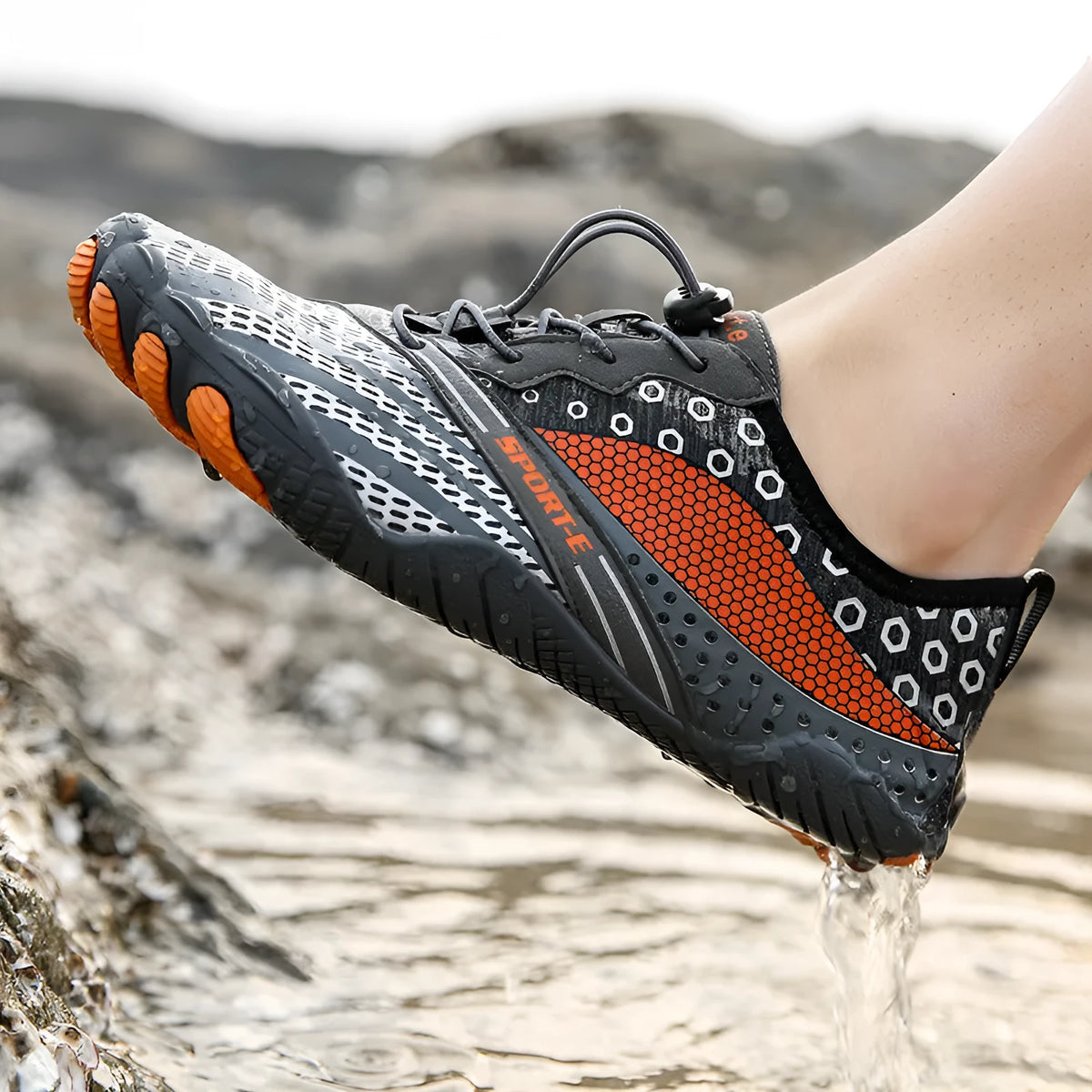 Five-finger wading shoes with Lycra upper and non-slip rubber outsole in black for river fishing.