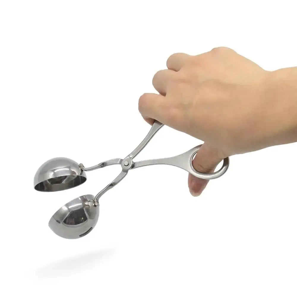 Stainless steel meatball maker tool clip with water-polished finish forming a uniform ball