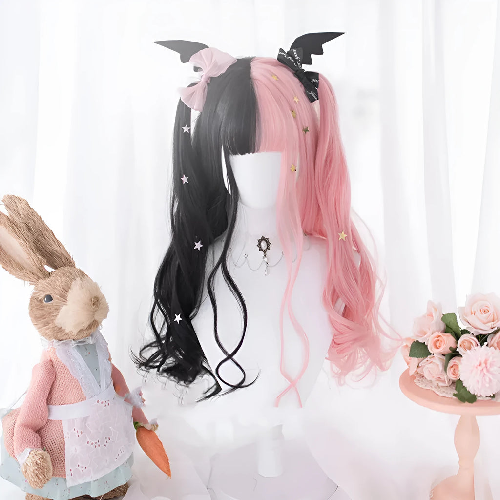 Harajuku Lolita long curly black and pink synthetic cosplay wig with bangs on a stand.