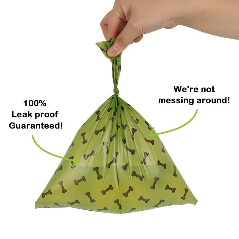 Military green degradable dog poop bags with black bone print measuring 23x33cm