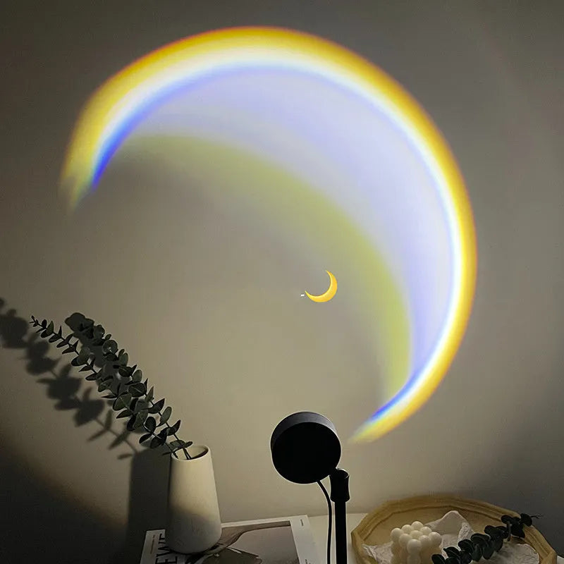 USB-powered moon projector lamp with Scandinavian design projecting rainbow pattern on wall