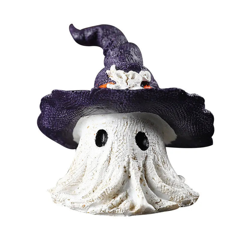 Purple and black resin wizard hat and ghost holiday ornaments.