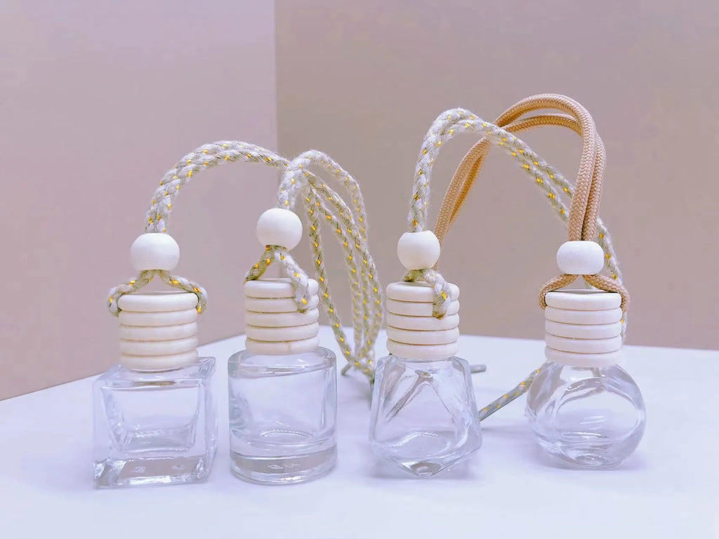 Glass car perfume pendant fragrance bottle in cylinder, diamond, flat drum, and square shapes