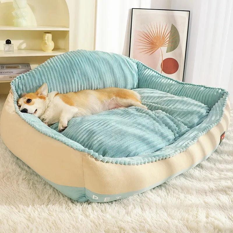 Large grey washable sofa dog bed mat with removable cover on a sofa.