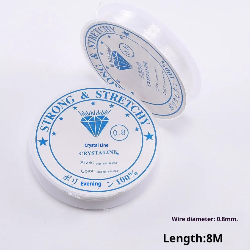 A reel of transparent crystal elastic cord for DIY jewellery making and craft beading.