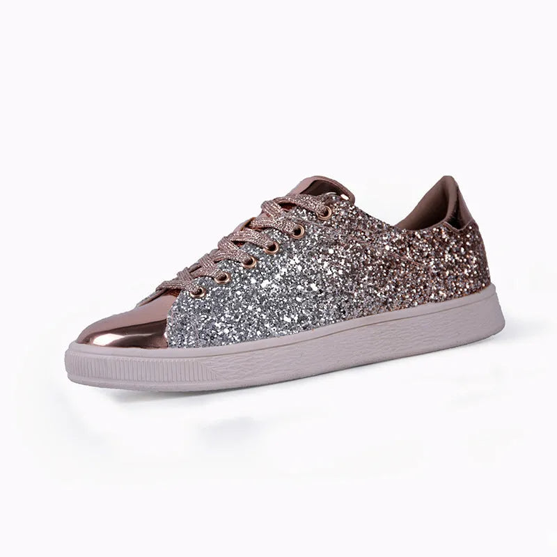 Women's black, pink and gold sequin casual low-top lace-up shoes with round toe and rubber sole.
