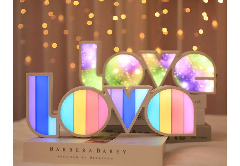 LED LOVE light decoration with rainbow-style lampshade showing romantic room illumination