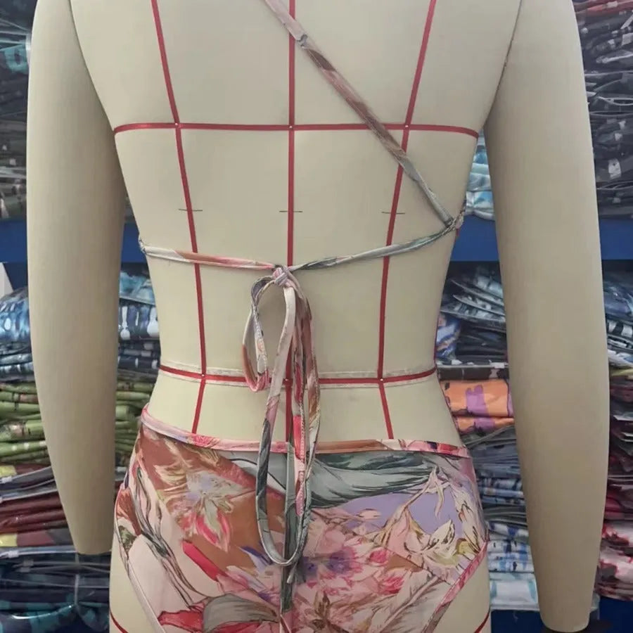 Women's rose gold patterned swimsuit in polyester fabric showing front design