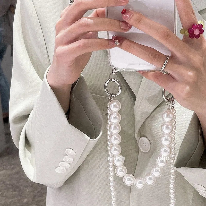 Big Pearl soft mobile phone case in Photo Colour with decorative chain, compatible with multiple iPhone models.