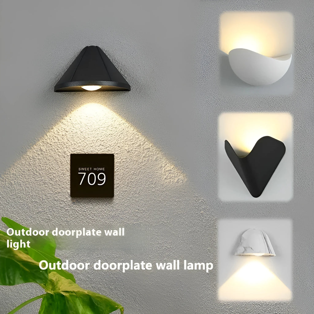 Black Bird's Nest design aluminium outdoor LED wall light with IP65 waterproof rating.