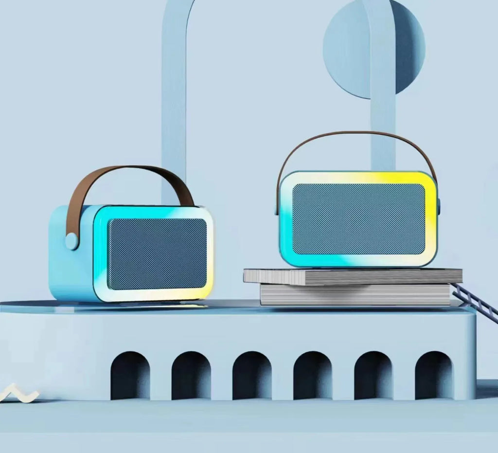 Portable Bluetooth speaker microphone with coloured LED lights in pink, sky blue, or white.