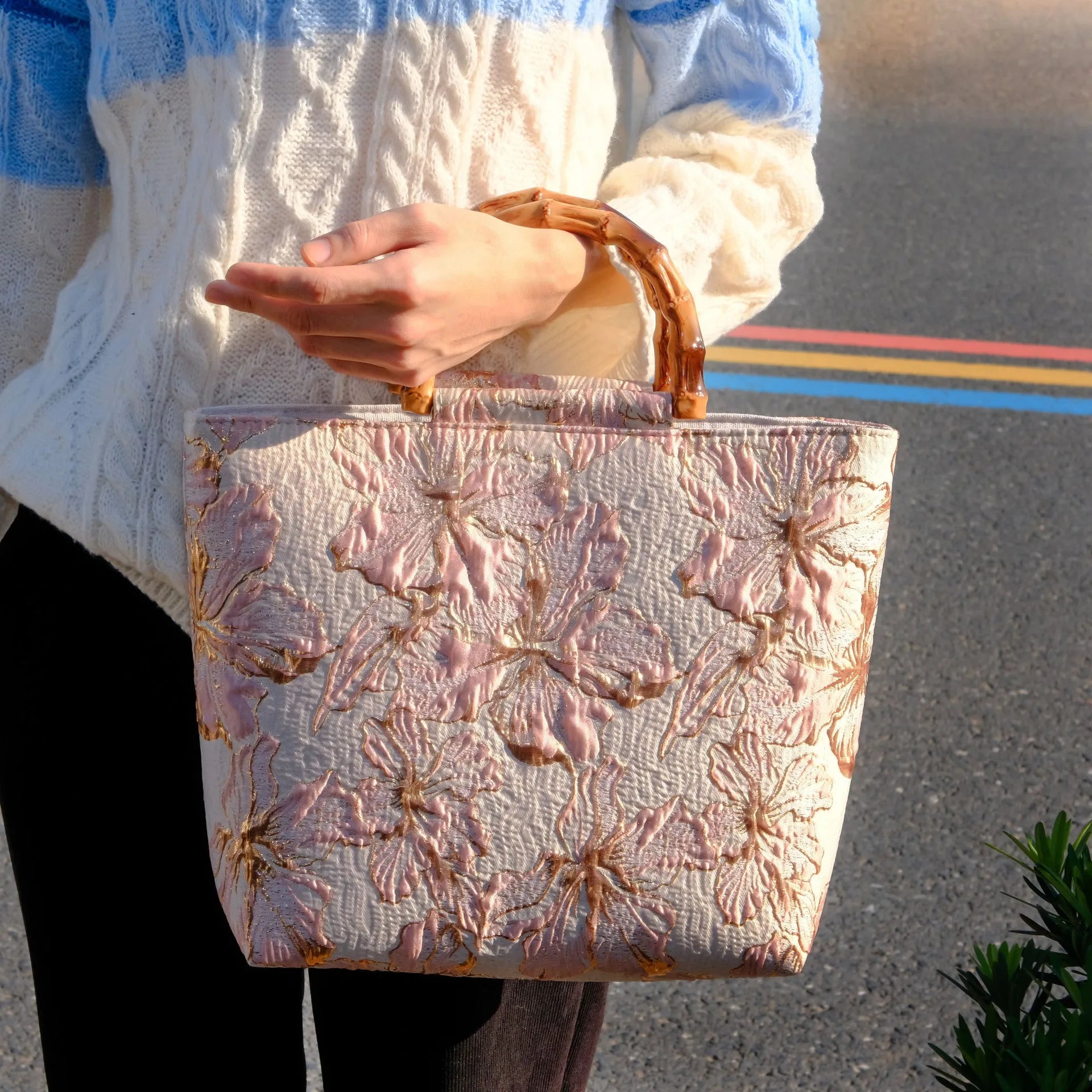 Light blue canvas shoulder bag with gold floral pattern showing 30x30x10 cm dimensions and double straps