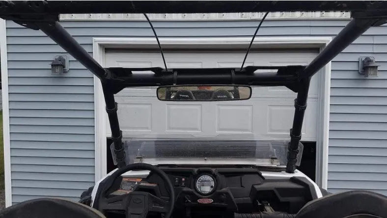 Black off-road wide-angle rearview mirror mounted on Polaris RZR roll cage