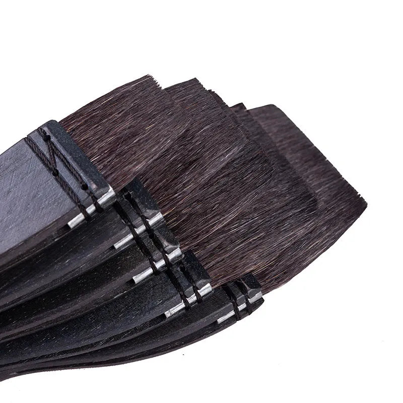 Professional grey squirrel hair makeup brush with a wooden handle, shown in multiple sizes.