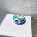 Copper gold plated zircon ring with geometric shape and drip oil finish in white pink colour