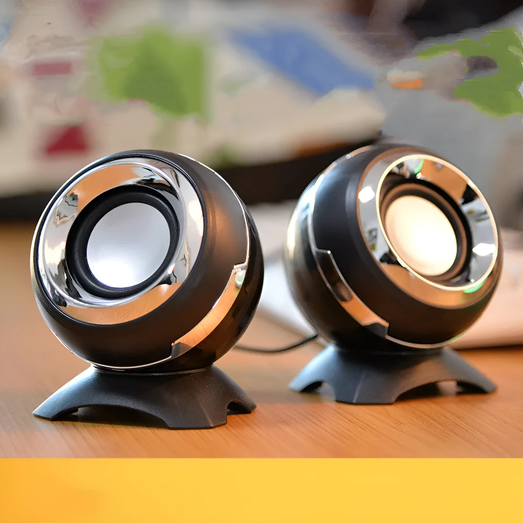 Compact black and gold USB desktop speakers for laptop computers with audio cable