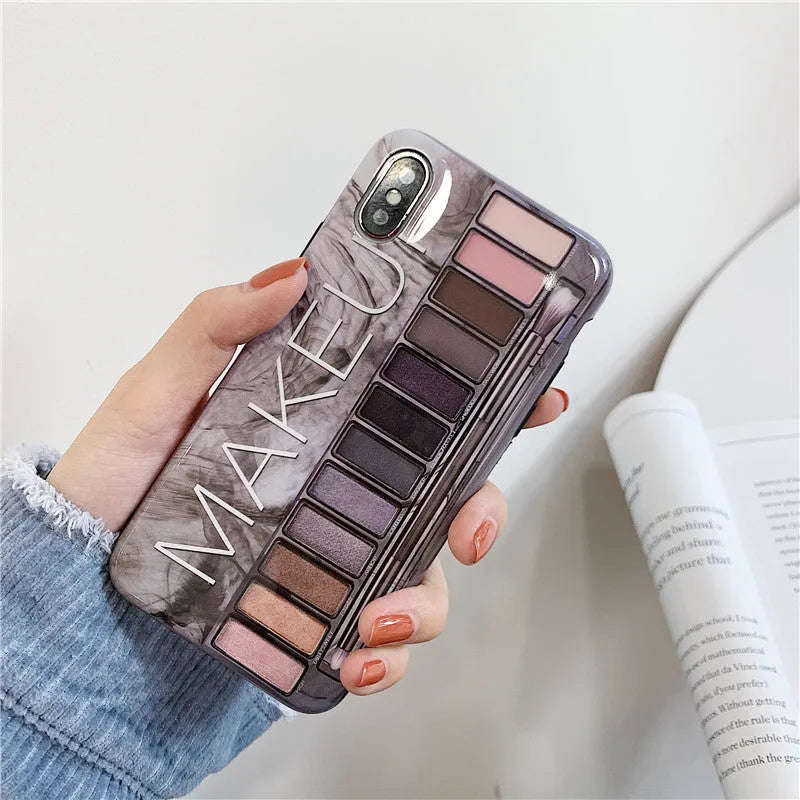 Flesh and grey silicone eye shadow phone cases for various iPhone models.
