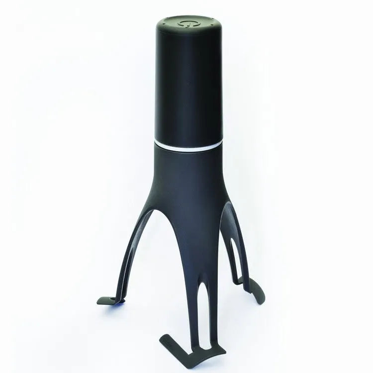 Green and grey automatic cooking mixer device for stirring sauces and soups.