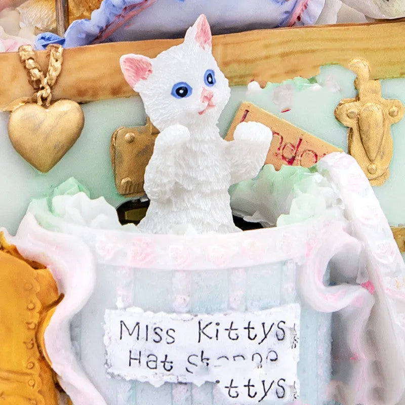 Cold porcelain European-style music box rotating with illuminated snowflakes, functioning as a jewellery case.