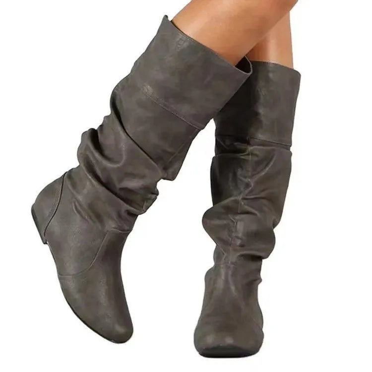 Women's black slip-on flat long boots with round toe and high shaft