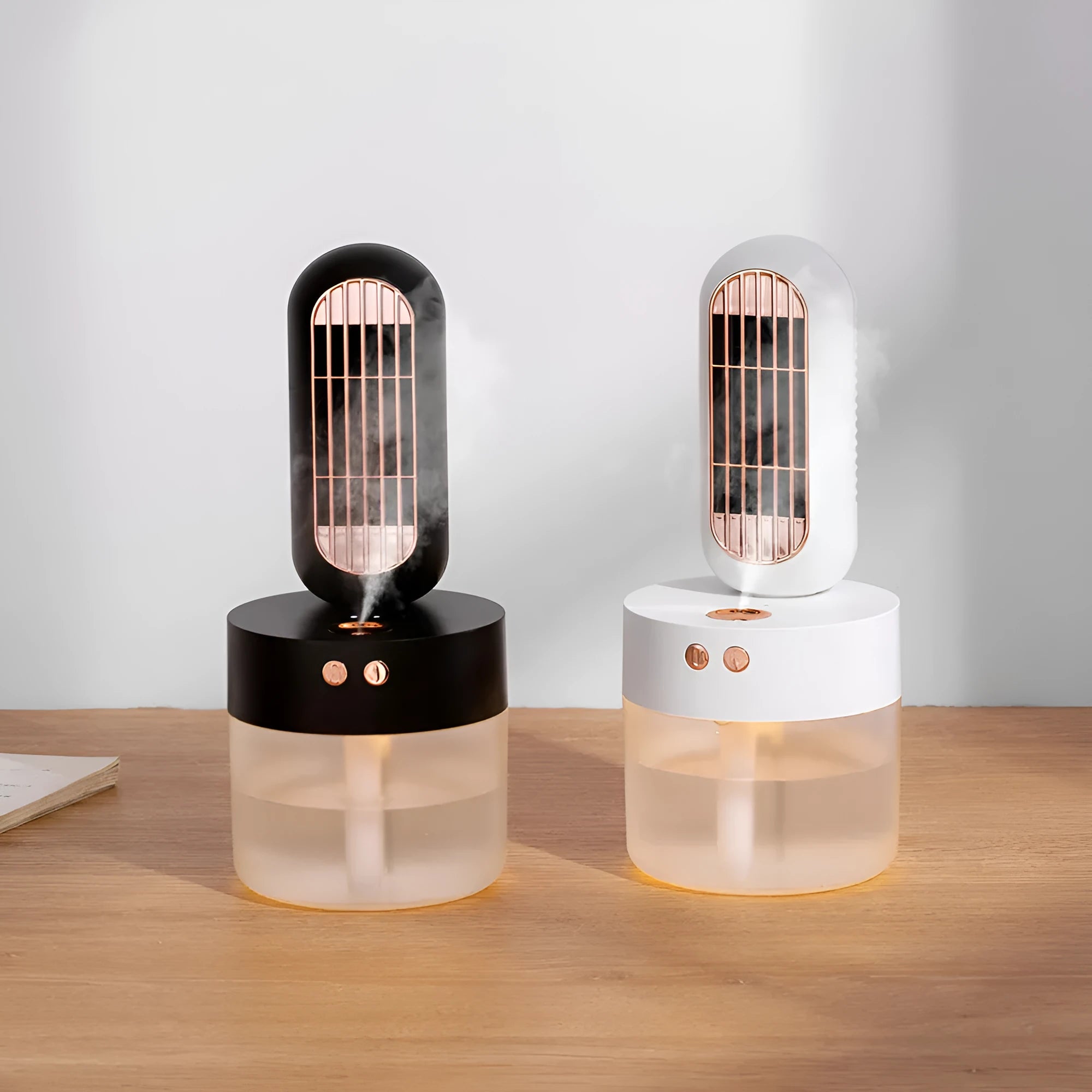 Small black and white oscillating humidifier fan with mechanical controls and charging capability