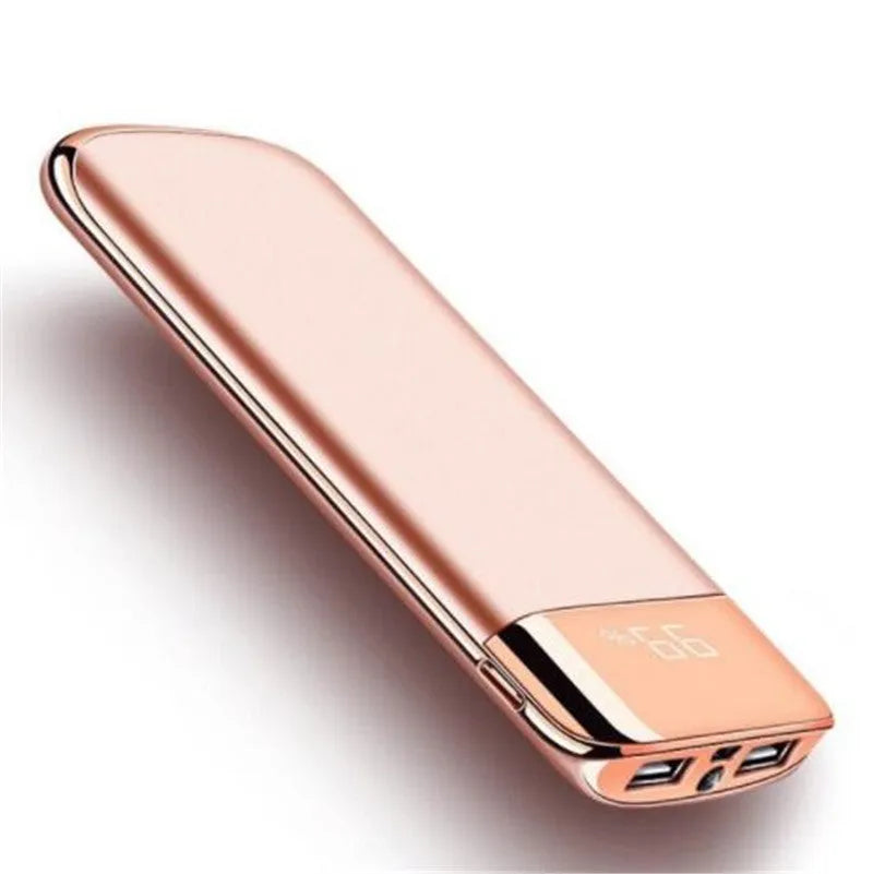Black portable power bank with LCD display showing battery percentage and two USB ports