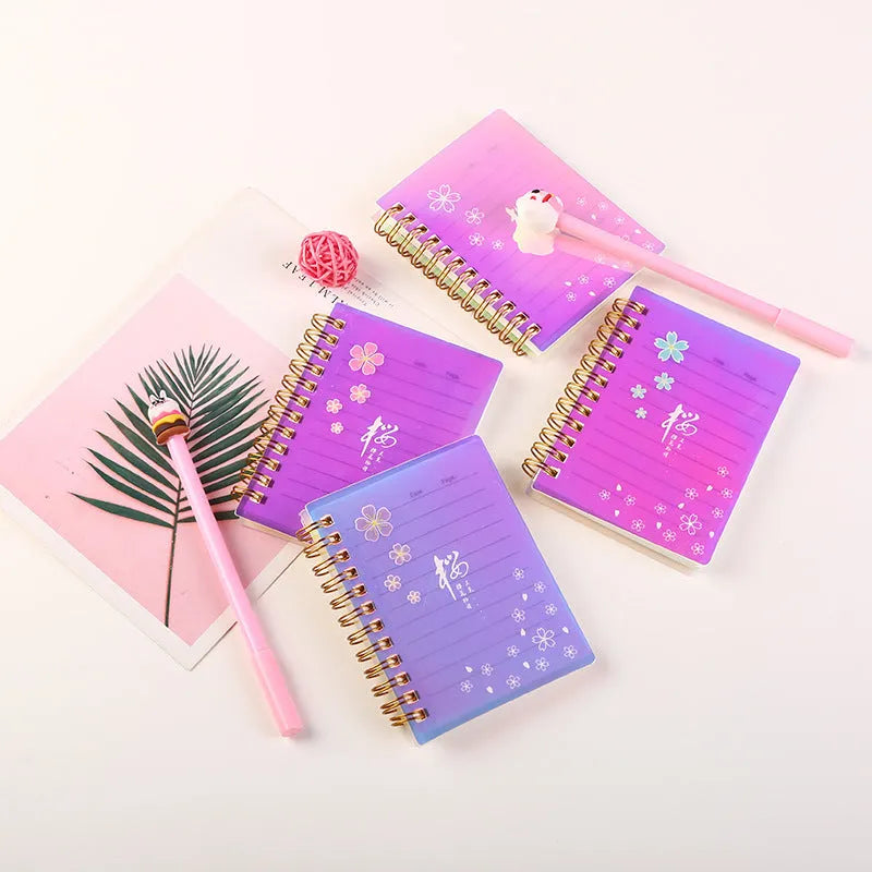 A7 spiral-bound pocket notepad with PP cover in one of four colour series: Cherry Blossom, Constellation, Ocean, or Universe.