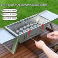 Small portable charcoal barbecue grill shown in folded and open positions for garden or camping use.