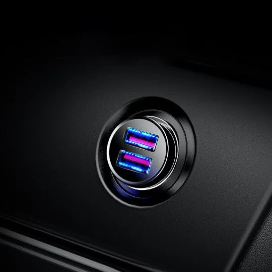 Black aluminium USB car charger with two ports showing 4.8A fast charging text
