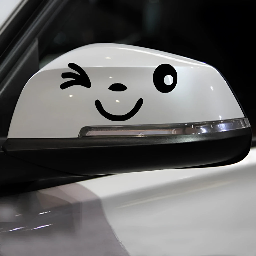 Reflective PET car rearview mirror sticker in black and silver irregular shape on a bumper