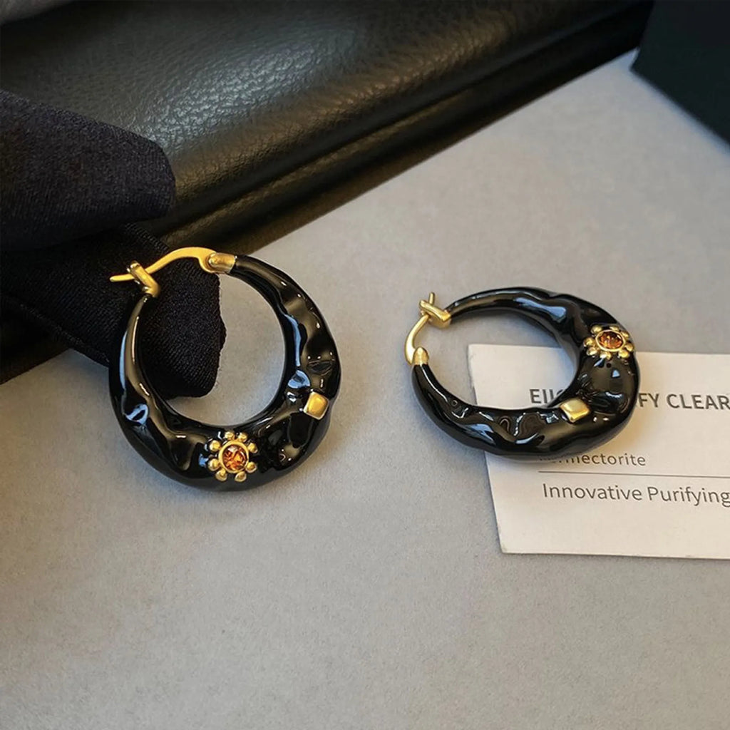 Hong Kong style retro stud earrings with dripping oil finish and rhinestone accents in black and red colours