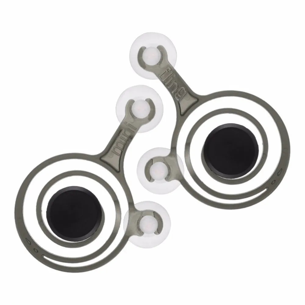 A pair of clear and black mini joysticks for mobile phone touchscreen gaming.
