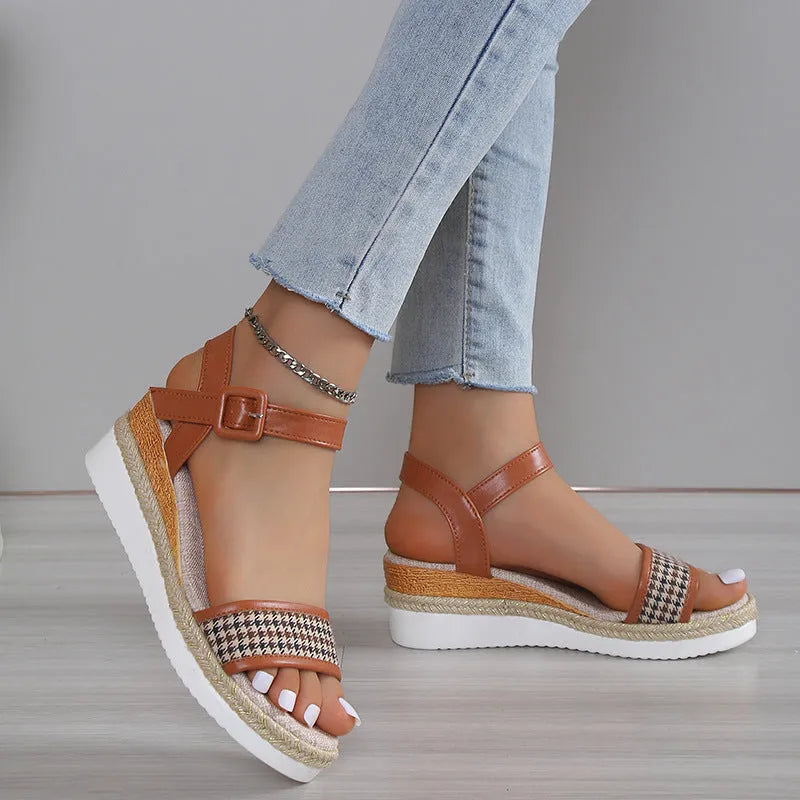 Women's houndstooth print buckle sandals in black with fish mouth toe on light background