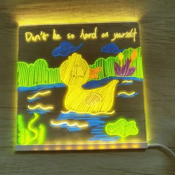 Large LED note board with colour illumination in Artboard style on a desk