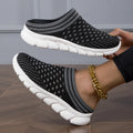 Women's Flyknit slipper shoes in a stripe pattern, showing hollowed-out design and sewing lines, on a viscose sole.