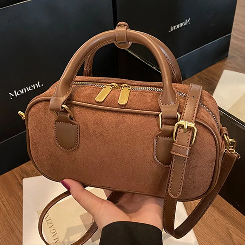 PU bowling bag in black, brown, coffee or green with optional pendant, horizontal square shape and single strap.