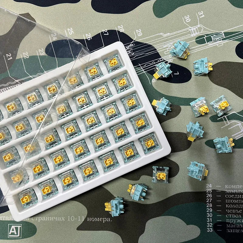 36 Sea Salt Lemon PRO Mute tactile keyboard switches for mechanical keyboards on a white background.