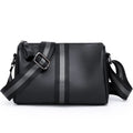 Black genuine leather one-shoulder crossbody bag showing front and interior with polyester lining